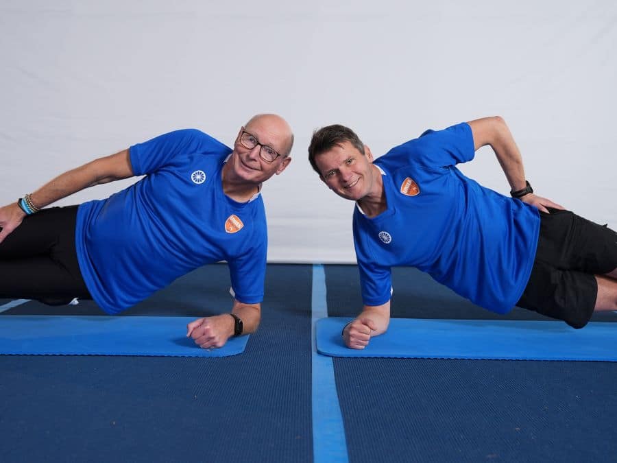 twee sporters op matje